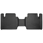 Black Husky Liners WeatherBeater second row floor liners for 2012-2023 Toyota Tacoma showing StayPut Cleats and raised edges.