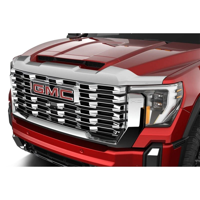 Chrome Husky Liners Aeroskin hood protector mounted on the front edge of a GMC Acadia hood.