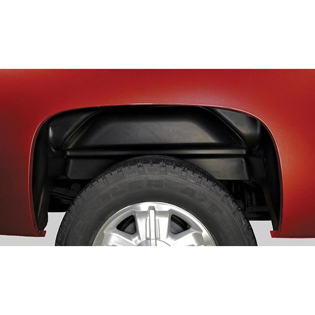 Husky Liners black impact-resistant thermoplastic rear wheel well guards for GMC Sierra 1500, 2500, and 3500 trucks.