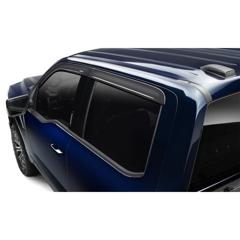 Husky Liners dark smoke low profile window deflectors 4-piece set for 2014-2019 Chevrolet and GMC trucks.
