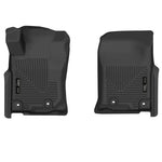 Black Husky X-Act Contour front floor liners featuring the rubberized DuraGrip surface and FormFit Edge spill protection.