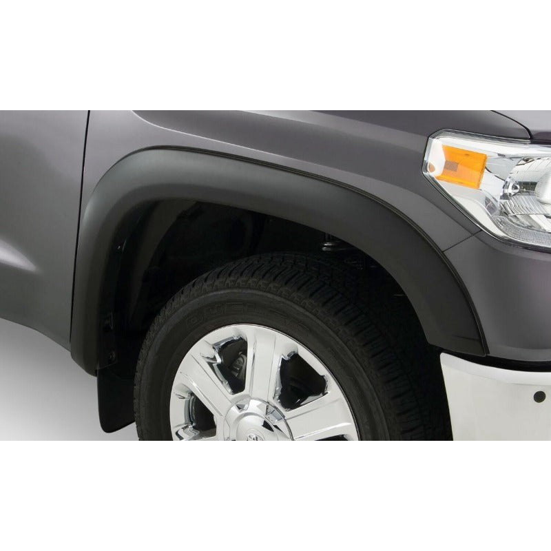 Four-piece set of Husky Liners OE Style smooth matte black fender flares for 2014-2021 Toyota Tundra.