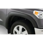 Four-piece set of Husky Liners OE Style smooth matte black fender flares for 2014-2021 Toyota Tundra.
