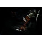 Black Husky X-act Contour front floor liners featuring raised containment edges and rubberized DuraGrip traction surface.