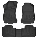 Black Husky Liners Weatherbeater floor mats for front and second row seating of a 2014-2018 Subaru Forester.