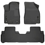 Black Husky Liners Weatherbeater floor mats for 2014-2019 Toyota Highlander front and second row seating areas.