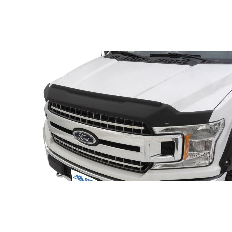 Textured black Husky Liners Aeroskin II low-profile hood protector with raised lip for 2015-2020 Ford F-150.