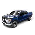 Husky Liners Aeroskin matte black low profile hood protector mounted on the hood of a 2015-2020 Ford F-150.
