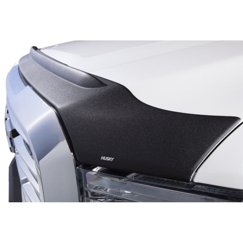 Textured black Husky Liners Aeroskin II low profile hood protector with raised lip for 2015-2022 Chevrolet Colorado.