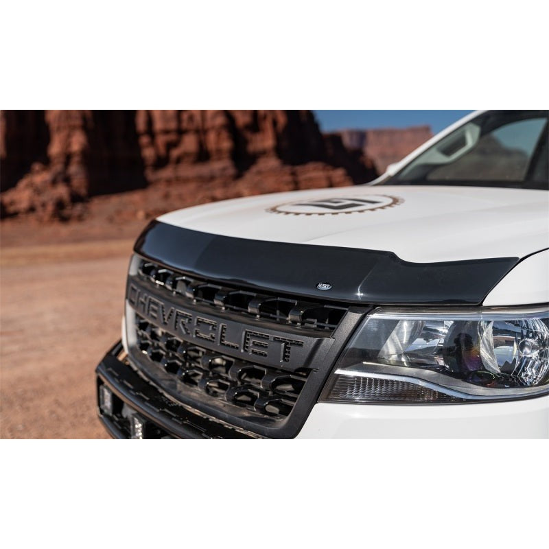 Smoke acrylic Husky Aeroskin hood protector mounted on the hood of a 2015-2022 Chevrolet Colorado.