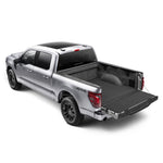 Husky Liners Guardian Impact full bed liner with tailgate coverage installed on a Ford F-150 5.5ft bed.