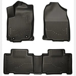 Black Husky Liners Weatherbeater front and second row floor mats for 2014-2019 Toyota Corolla.