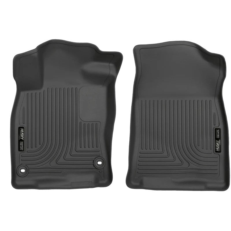 Black Husky X-Act Contour front floor liners for Honda Civic and Insight with DuraGrip texture and StayPut cleats.