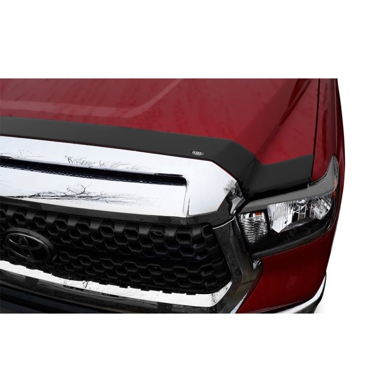 Smoke finish acrylic Husky Liners Aeroskin hood protector for 2016-2023 Toyota Tacoma models.