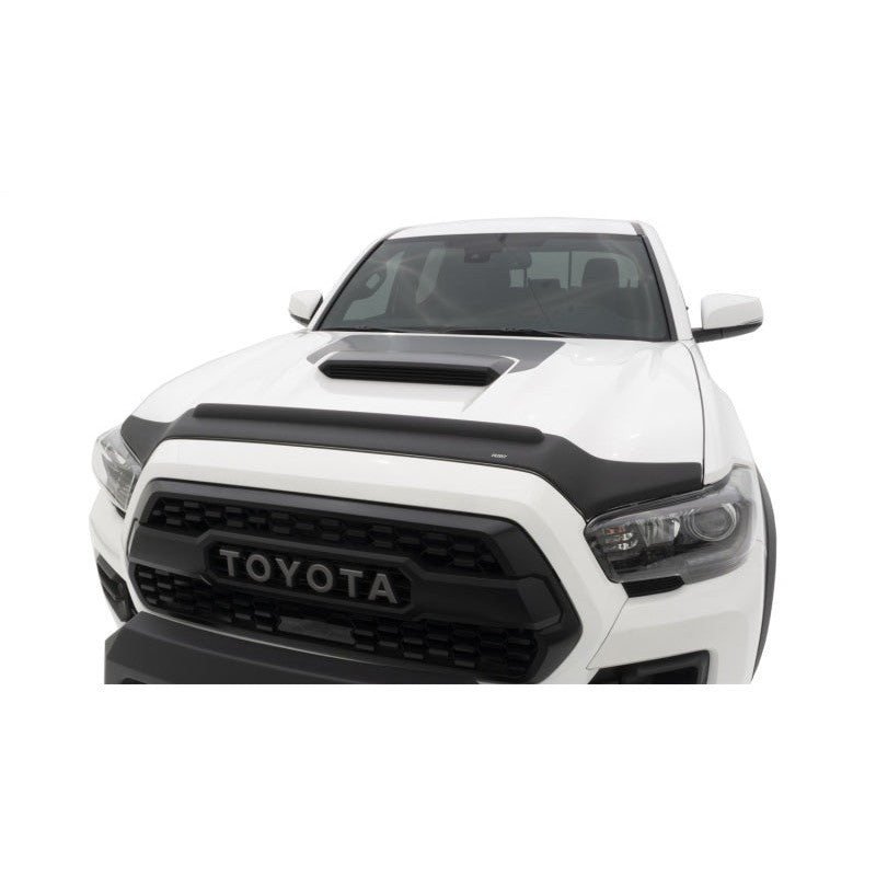 Husky Liners Aeroskin II textured black low profile hood protector installed on a 2016-2023 Toyota Tacoma