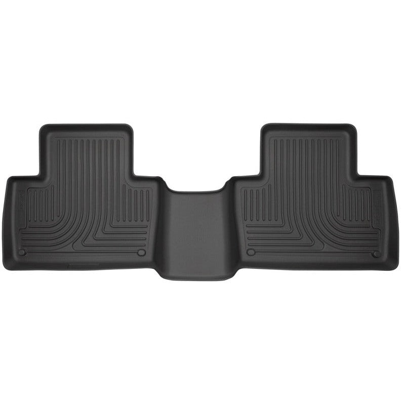 Black Husky Liners WeatherBeater 2nd seat floor liner showing textured surface and raised containment edges.