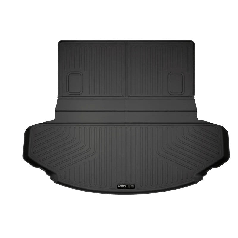 Black Husky Liners Weatherbeater cargo liner for 2016-2023 Mazda CX-9 showing textured surface and raised containment edges.