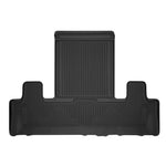 Husky Liners X-act Contour black 3rd row floor liners featuring DuraGrip rubberized surface and FormFit Edge protection.