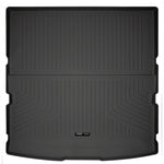 Black Husky Liners WeatherBeater rear cargo liner with raised spill-containment edges and StayPut cleats.
