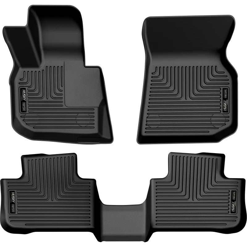 Black Husky Liners Weatherbeater front and second row floor mats for 2018-2025 BMW X3 and X4.