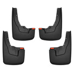 Husky Liners custom-molded black thermoplastic front and rear mud guards for 2019-2024 Ram 1500.