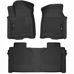 Husky Liners X-act Contour black rubberized front and second row floor mats for Chevrolet Silverado and GMC Sierra trucks.