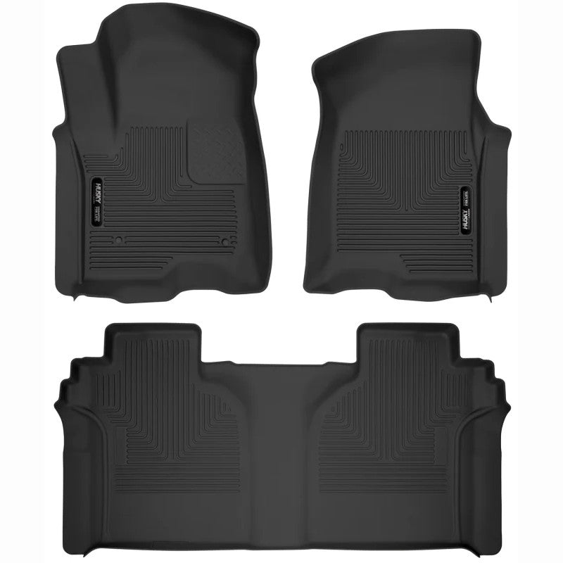 Husky Liners X-act Contour black rubberized front and second row floor mats for Chevrolet Silverado and GMC Sierra trucks.