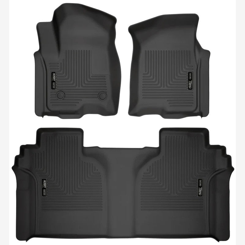 Black Husky Liners WeatherBeater front and second-row floor mats for 2019-2026 Chevrolet Silverado and GMC Sierra trucks.