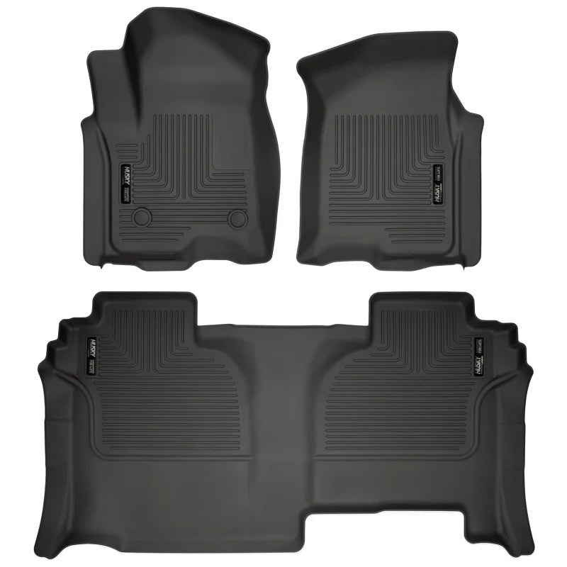 Husky Liners Weatherbeater black front and second row custom-fit floor mats for Chevy Silverado and GMC Sierra Double Cab.