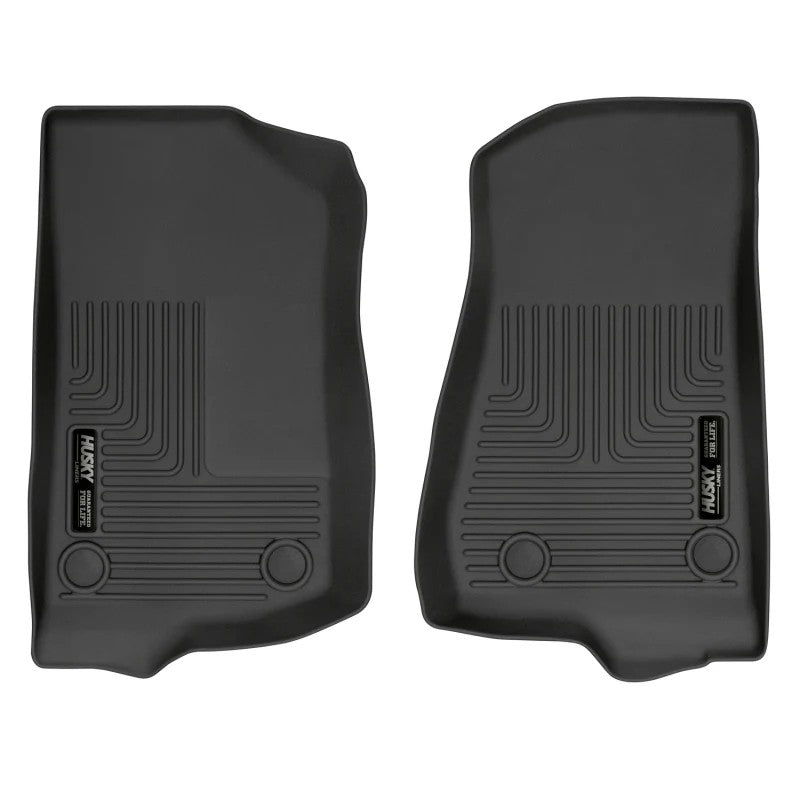 Black Husky Liners WeatherBeater front row floor liners for Jeep Wrangler and Gladiator.