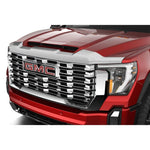 Chrome Husky Liners Aeroskin hood protector installed on the front edge of a 2019-2025 Ram 2500 heavy duty truck.