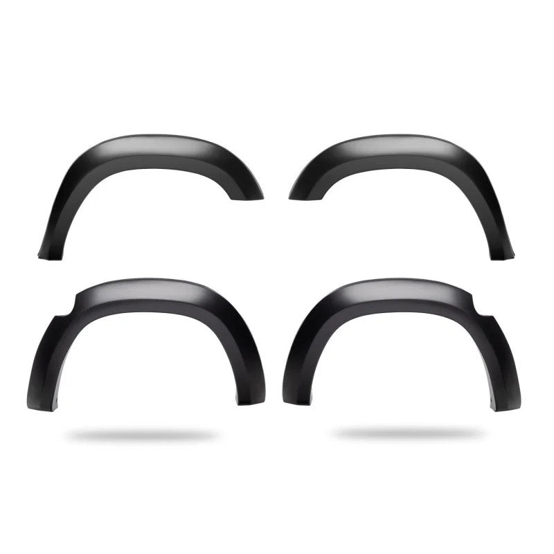 Set of four matte black Husky Liners Extend-A-Fender style fender flares for Ram 2500 and 3500 pickup trucks.