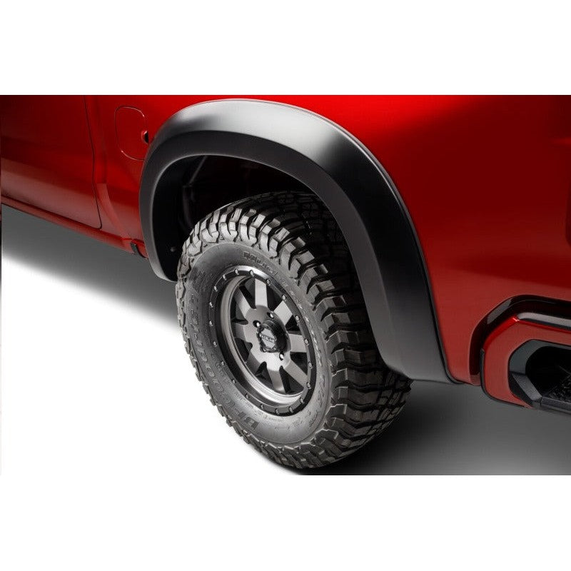 Four matte black Husky Liners Extend-A-Fender flares for 2019-2026 GMC Sierra 1500.
