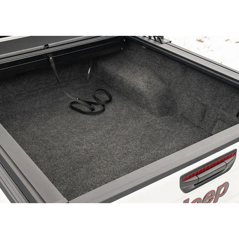 Husky Liners Guardian Comfort full bed liner with DriGard surface installed in a Jeep Gladiator 5ft truck bed.