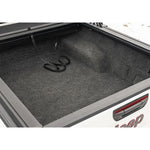 Husky Liners Guardian Comfort full bed liner with DriGard surface installed in a Jeep Gladiator 5ft truck bed.