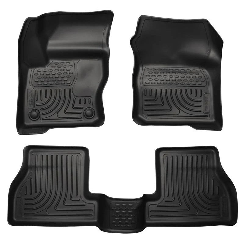 Husky Liners WeatherBeater black front and rear floor mats for 2011-2015 Ford Focus showing FormFit Edge and StayPut Cleats