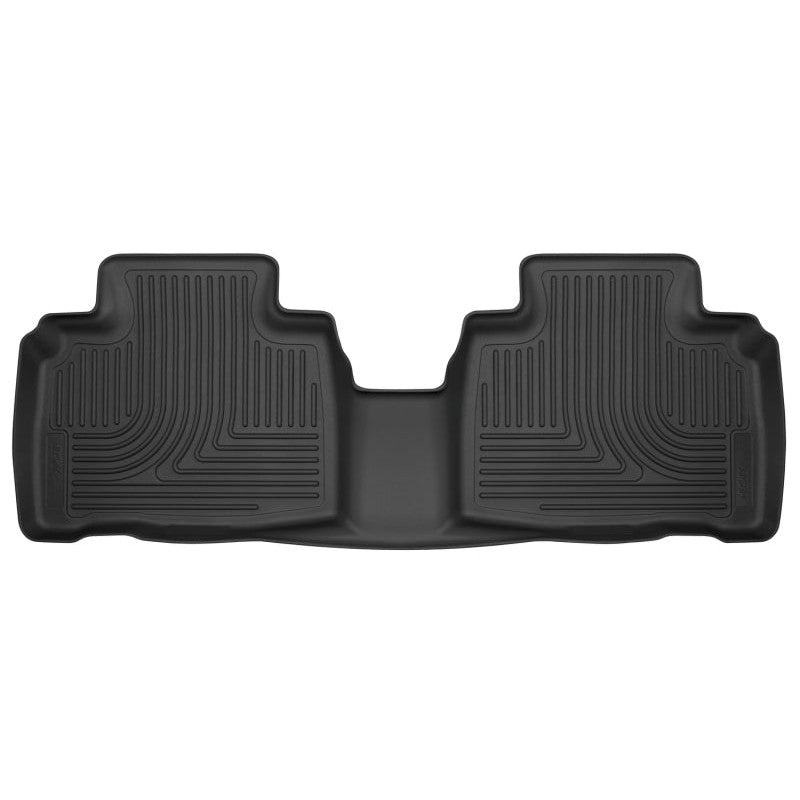 Black Husky Liners X-act Contour 2nd row floor liner for 2015-2024 Ford Edge showing DuraGrip texture and StayPut Cleats.