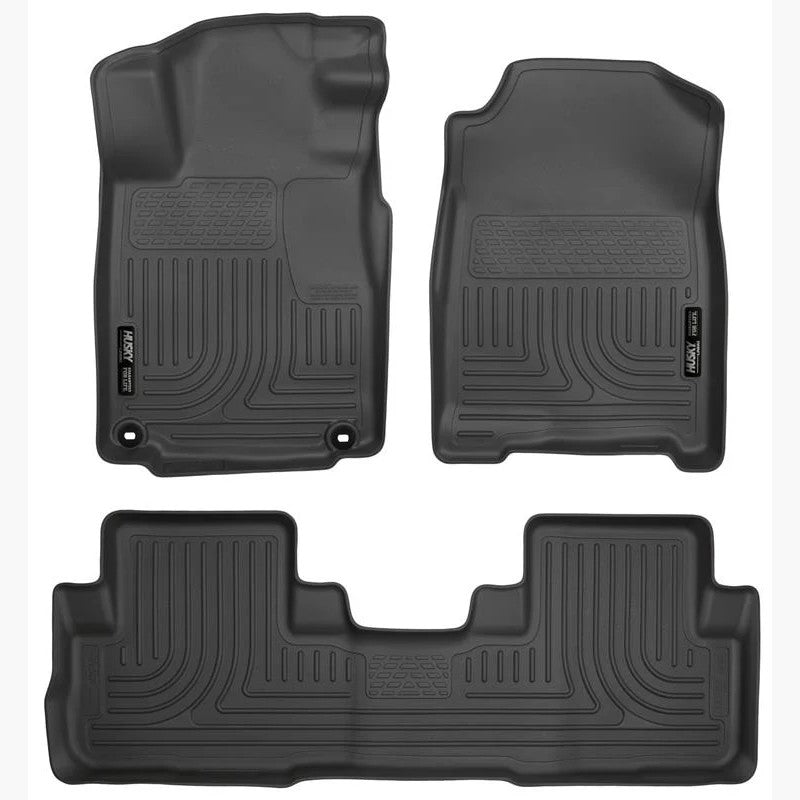 Husky Liners WeatherBeater black front and rear floor liner set installed in a vehicle