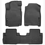 Husky Liners WeatherBeater black front and rear floor liner set installed in a vehicle