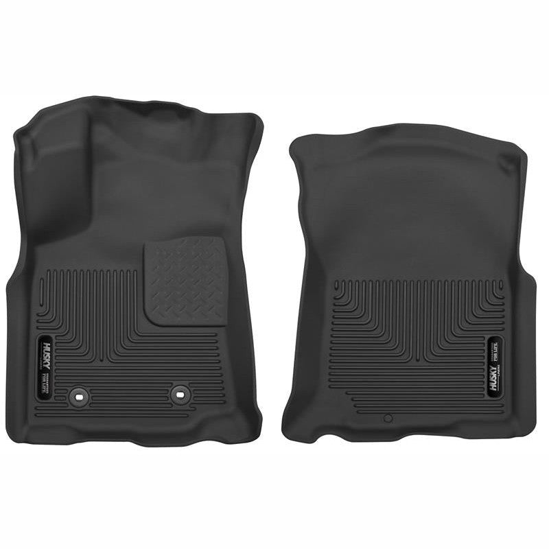 Black Husky Liners X-act Contour front floor liners with rubberized texture and StayPut Nibs for Toyota Tacoma.