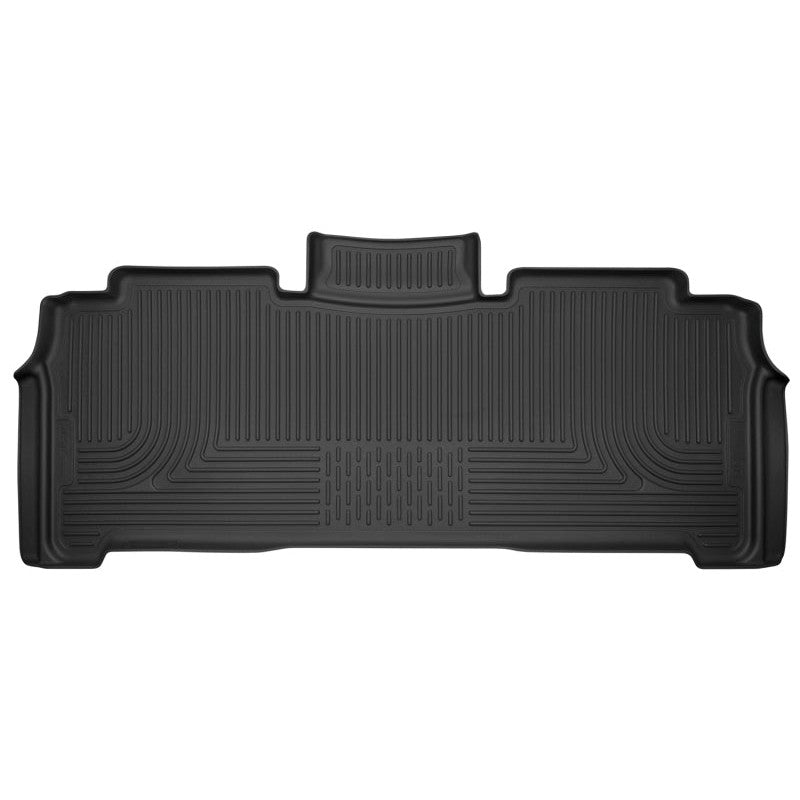 Black Husky Liners X-act Contour 2nd seat floor liner for 2017-2024 Chrysler Pacifica and Voyager models.