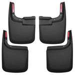 Husky Liners black custom-molded front and rear mud guards for 2017-2026 Ford F-250 and F-350 Super Duty trucks.