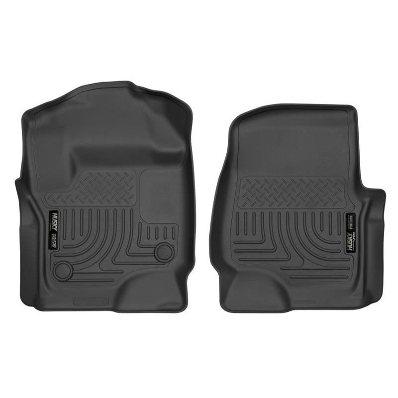 Pair of black Husky WeatherBeater front floor liners featuring deep channels and StayPut anti-skid cleats.