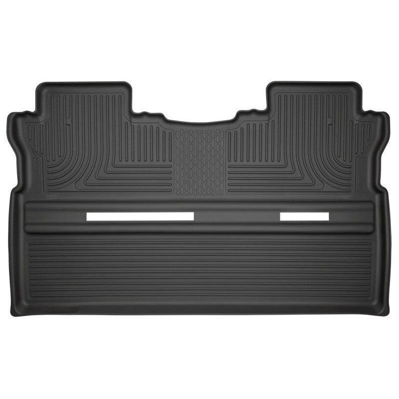 Husky Liners WeatherBeater 2nd row black floor liner for 2017-2025 Honda Ridgeline showing StayPut cleats and FormFit Edge.