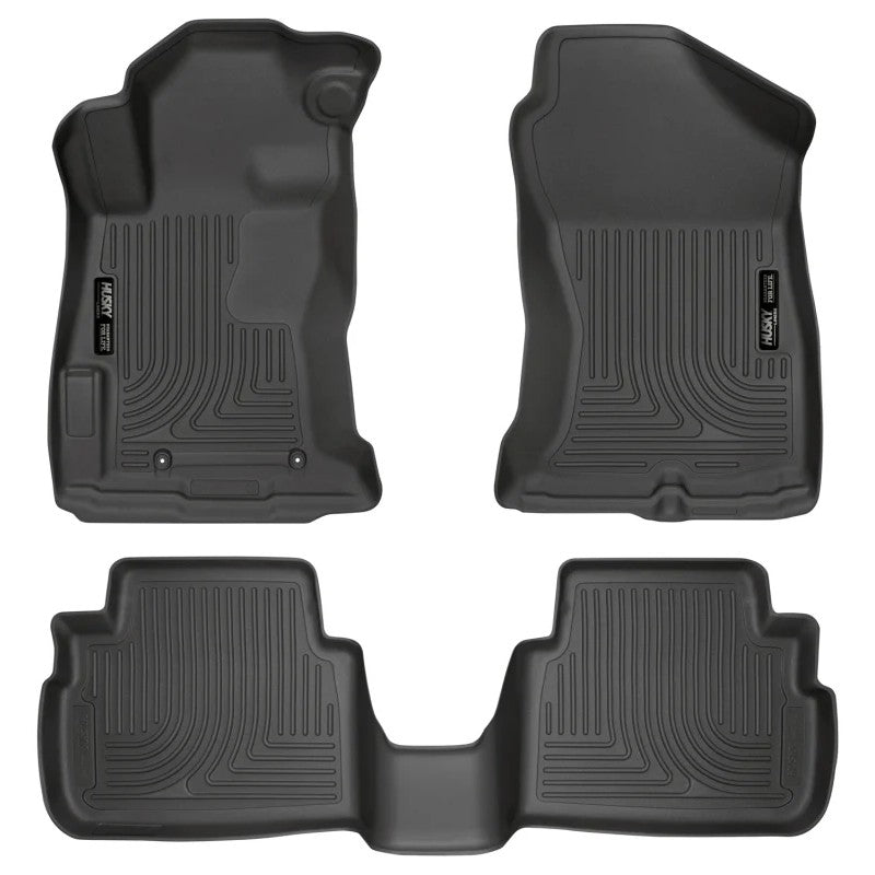 Black Husky Liners Weatherbeater front and rear floor mats for 2017-2024 Subaru Impreza and Crosstrek.