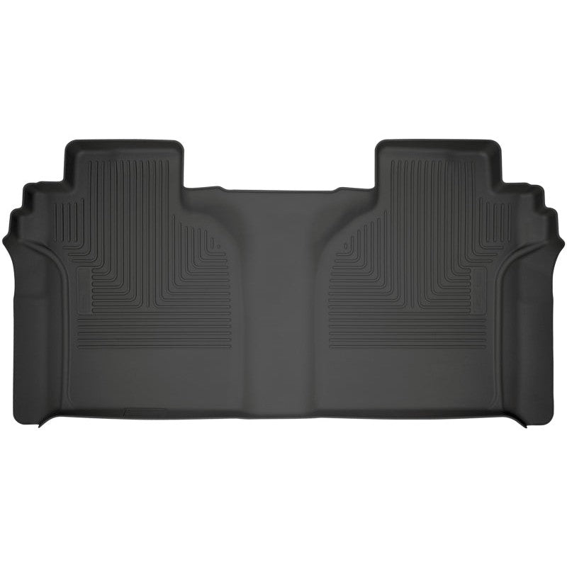 Black Husky Liners WeatherBeater 2nd row floor liner with raised edges and StayPut Cleats for truck interior protection.