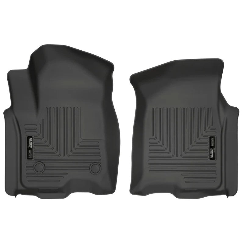 Husky Liners WeatherBeater black front floor liners with raised edges and non-slip surface for 2019-2026 GM trucks.