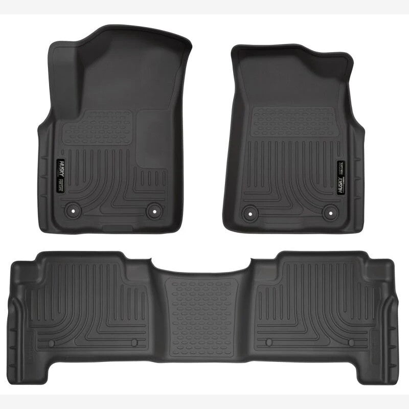 Black Husky Liners Weatherbeater front and second-row floor liners for a 2019-2024 Infiniti QX80 or Nissan Armada.