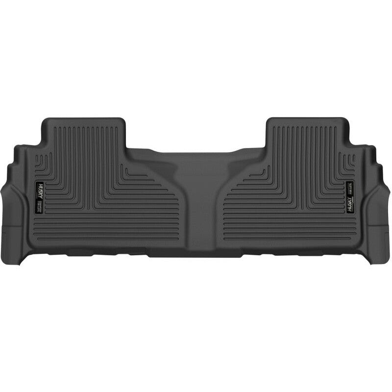 Husky Liners X-Act Contour black 2nd row floor liners with DuraGrip rubberized surface and FormFit Edge protection.