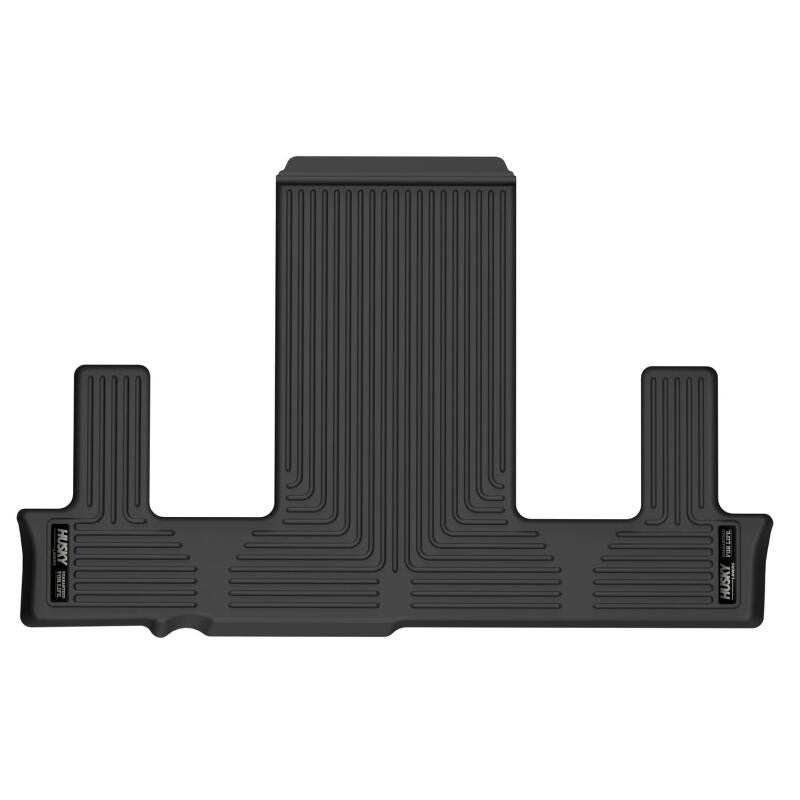 Black Husky Liners X-act Contour 3rd row floor liner with DuraGrip texture and raised FormFit spill containment edges.